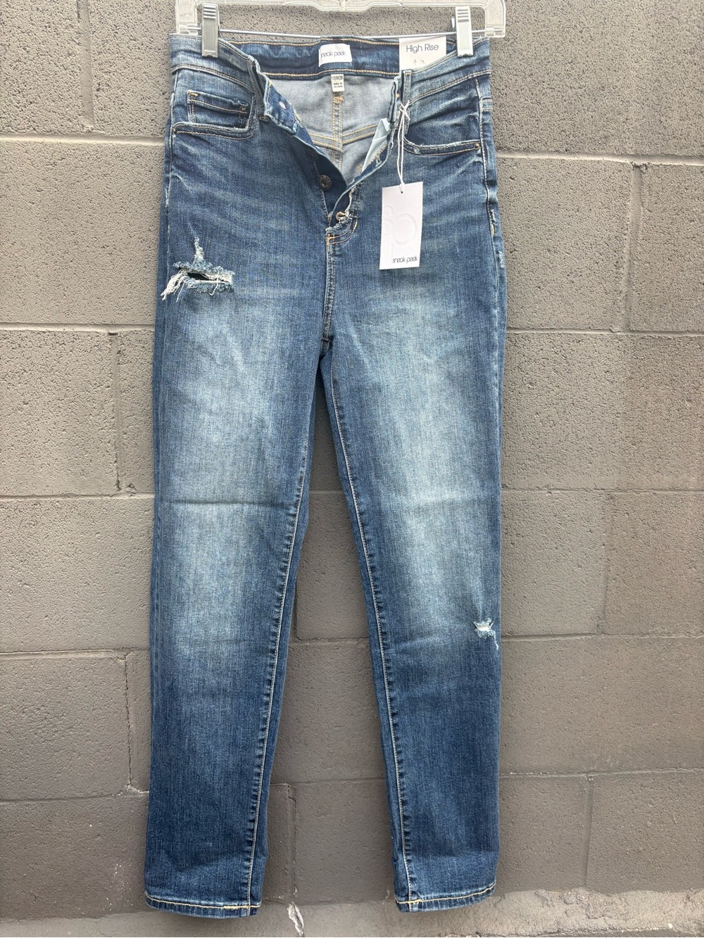 Sneak Peek High Rise Distressed Blue Jeans